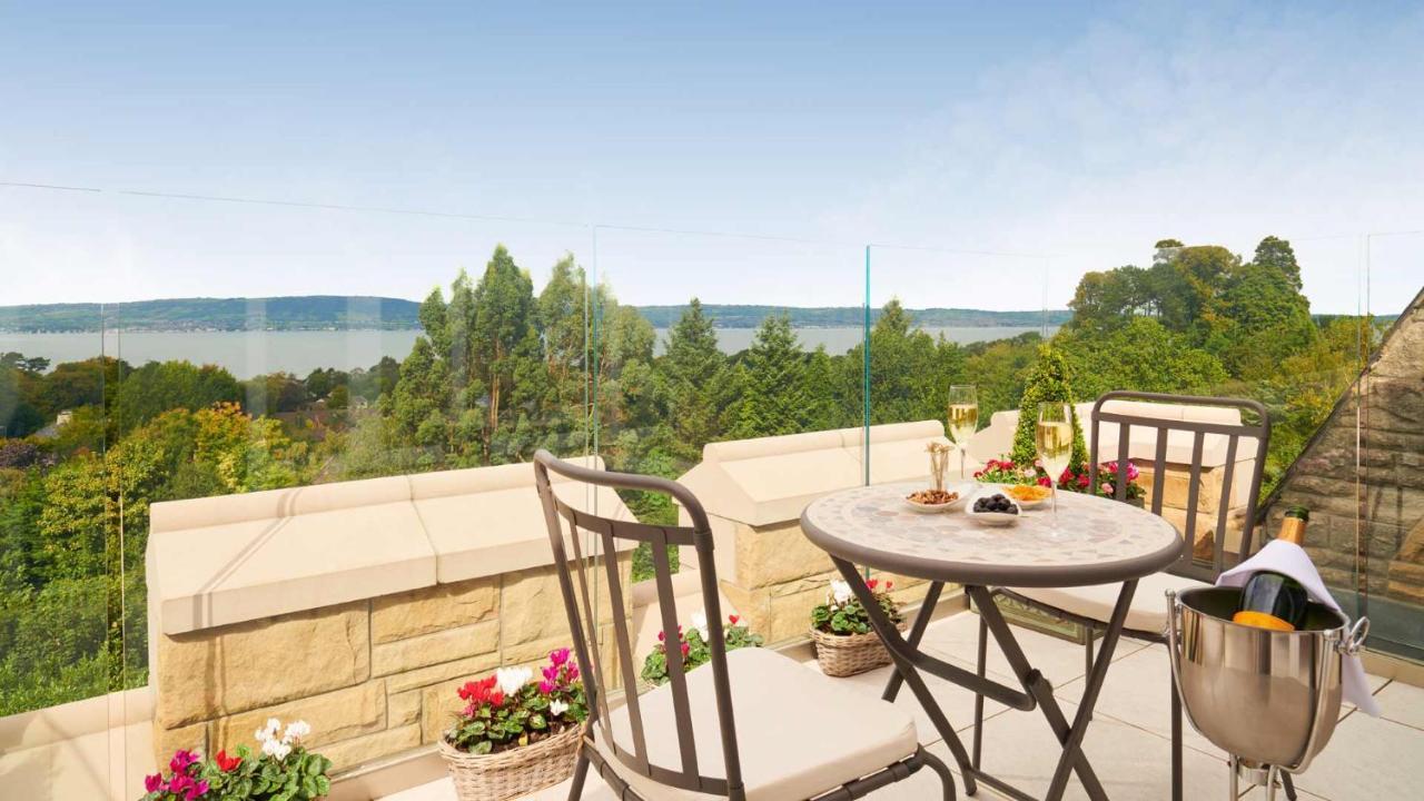 The Culloden Estate And Spa Holywood  Exterior foto A view of the lake from the balcony of a house in the village